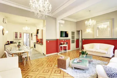 a living room with a couch and a table at Le Philibert - SPLENDID, 6 BEDROOMS, 12P, NICE PORT, Air Cond in Nice