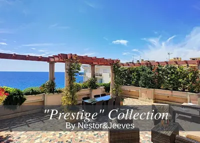 a view of the ocean from the balcony of a resort at Nestor&Jeeves - SEA VIEW TERRACE PENTHOUSE - Exceptional terrace - Top floor in Nice