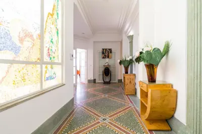 a hallway with a map on the wall and a window at Nestor&Jeeves - SEA VIEW TERRACE PENTHOUSE - Exceptional terrace - Top floor in Nice