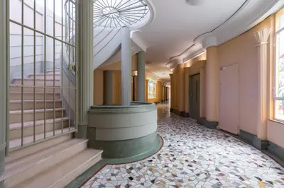 a hallway of a building with a spiral staircase at Nestor&Jeeves - SEA VIEW TERRACE PENTHOUSE - Exceptional terrace - Top floor in Nice