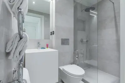 a bathroom with a shower and a toilet and a sink at DALPOZZO HYPER CENTRE PROCHE MER in Nice