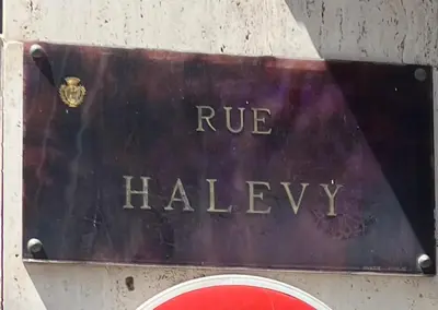 a sign that saysrue haley on it at Chez Eva in Nice