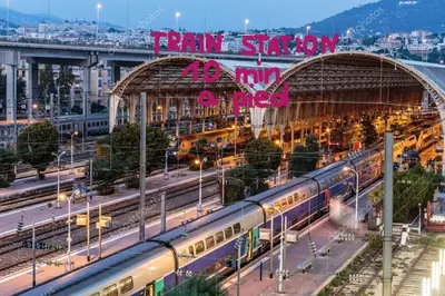 a train station with a train on the tracks at STUDIO VIEILLE VILLE in Nice