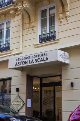 a building with a sign for a hotel at Résidence Aston la Scala in Nice