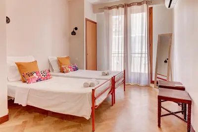 a bedroom with two beds in a room at PROMENADE HOLIDAY - PALATIN PROMENADE in Nice