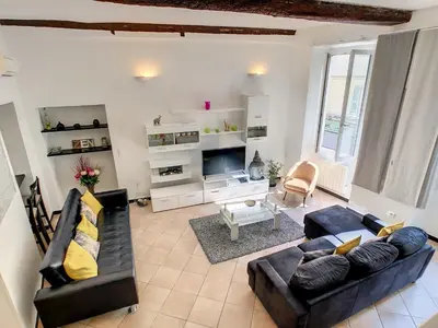 a living room with two couches and a tv at Nestor&Jeeves - ZEN - Central - Very close beaches in Nice