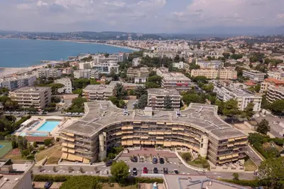 an aerial view of a city with a building at Résidence Pierre & Vacances Heliotel Marine in Saint-Laurent-du-Var