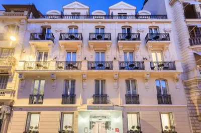 a facade of a building in paris at Villa Otero by Happyculture in Nice
