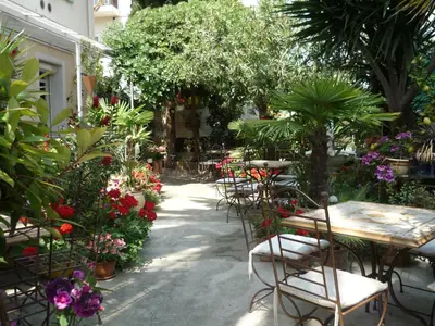a buffet filled with different types of fruits and vegetables at Logis Hôtel Villa Victorine in Nice