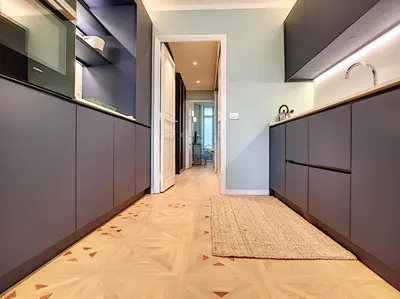 a hallway of a house with wooden floors at Nestor&Jeeves - LAGOON PROMENADE - Central - Sea front in Nice