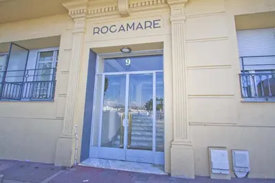 a door to a building with a sign on it at PROMENADE HOLIDAY - OLD TOWN PANORAMIC in Nice