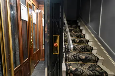 an open door with a stairway withoren at Hotel Le Meurice in Nice