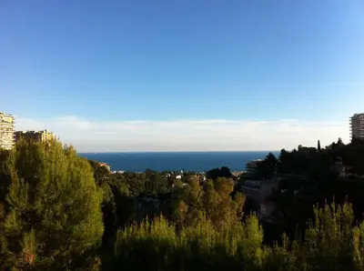 a view of the ocean from a city at La Madonette in Nice