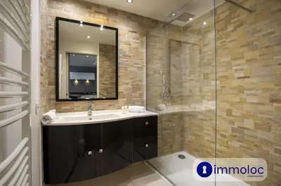 a bathroom with a sink and a shower at Air-conditioned house with private pool in Cagnes-sur-Mer