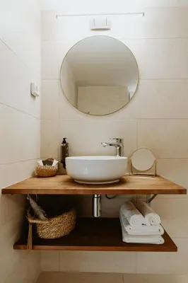 a bathroom with a sink and a mirror at Palm Boutique Hôtel Nice in Nice