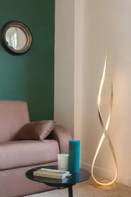 a living room with a couch and a table at Beautiful apartment in the heart of Nice in Nice