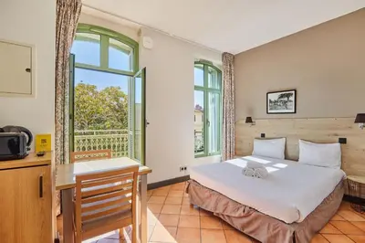 an aerial view of a city and the beach at Appart'hôtel Odalys City - Nice Centre in Nice