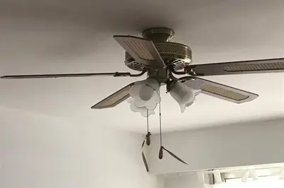 a ceiling fan is hanging from a ceiling at studio centre nice proche de mer in Nice