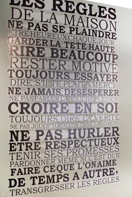 a drawing of the word racism in different languages at LE REFUGE avec terrasse et jardin, en plein centre-ville, gare 5 minutes à pieds in Nice