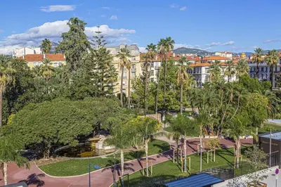 an aerial view of a park with trees and buildings at MY CASA - VICTOR HUGO - Beautiful Apartment - View over Garden in Nice
