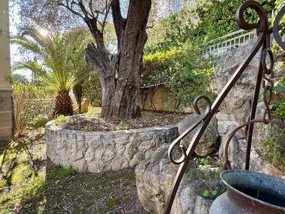 a view of a large body of water with boats at Villa Soraya Nice - Sunny appartment Cote d'Azur with large garden in Nice