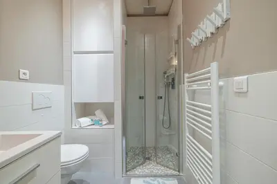 a bathroom with a shower and a toilet at MY CASA - JOFFRE 49-D - Charming 2 bedroom - Carré d'Or in Nice