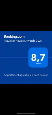 a screenshot of a phone screen with a boarding confirm message at Appartement agréable en bord de mer in Villefranche-sur-Mer