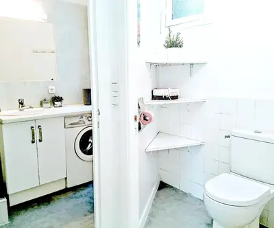 a bathroom with a toilet and a sink at Le Palladium quartier Tzaréwitch Nice in Nice