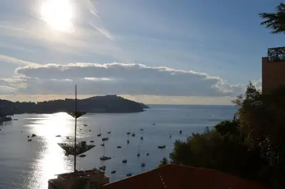 a view of a large body of water with boats at NEREIDES - Appartement 4 personnes avec Vue Mer exceptionnelle à Villefranche-sur-Mer in Villefranche-sur-Mer
