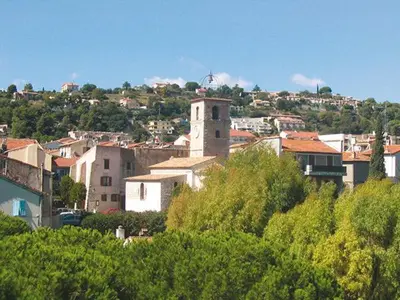 a view of a city with a clock tower at Cosy Room in the centre in Saint-Laurent-du-Var