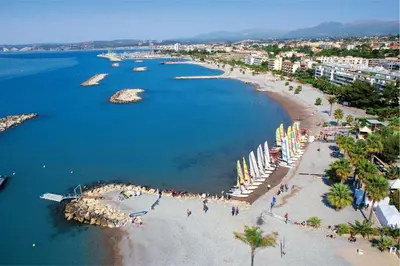 an aerial view of a beach with umbrellas and people at Cosy Room in the centre in Saint-Laurent-du-Var