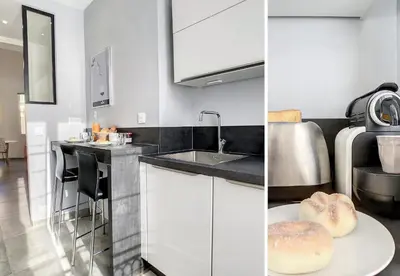 a kitchen with a sink and a counter with donuts on a plate at Nestor&Jeeves - BOW WINDOW BUFFA - City center - Very close beach in Nice