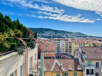 a view of a city with buildings at Risso - charming one bedroom with a balcony in Nice
