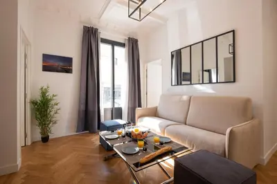 a living room with a couch and a table at 