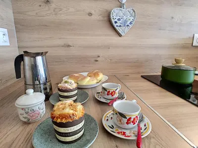 a table topped with cups of tea and pastries at Nestor&Jeeves - LIDO BEACH - Central - Very close sea - Pedestrian zone in Nice