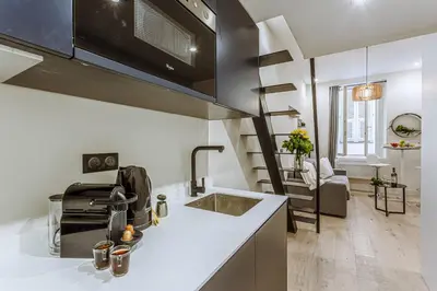 a kitchen with a sink and a counter top at MY CASA - BUNICO 1 - Old Town Renovated Studio in Nice