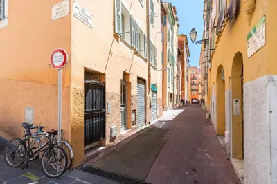 a bike parked on the side of a street at 8 CONDAMINE - Stylish in Old Town - 2 pièces - 300m de la mer in Nice