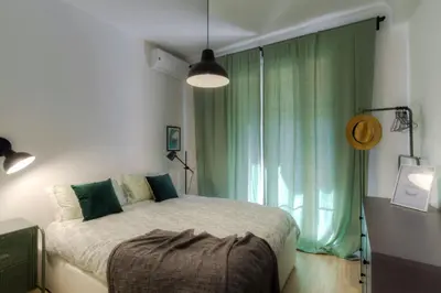 a bathroom with a white sink and a mirror at #29 Suite Gambetta AC Sea view 2 bedrooms 1min Walk to Promenade & Sea in Nice