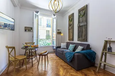 a living room with a couch and a table at MY CASA - DIJON - Near Train Station - Malaussena in Nice