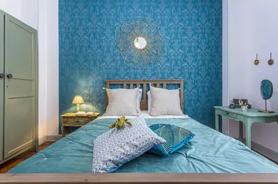 a blue bedroom with a bed with two pillows at MY CASA - DIJON - Near Train Station - Malaussena in Nice