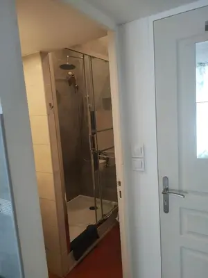 a bathroom with a shower with a glass door at Bienvenue sur la Cote d'Azur in Nice