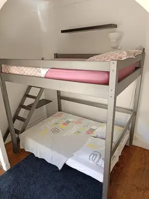 a bunk bed with a mattress on the bottom bunk at Charmant studio climatisé centre Villefranche sur mer in Villefranche-sur-Mer