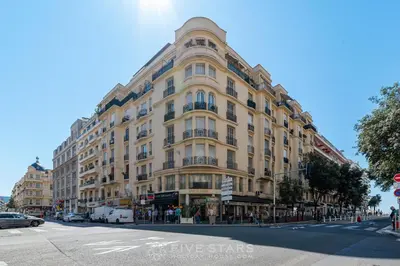 a large building on the corner of a street at Studio Imperator Five stars holiday house in Nice