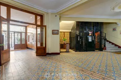 a room with a hallway with a door and a tile floor at Studio Imperator Five stars holiday house in Nice