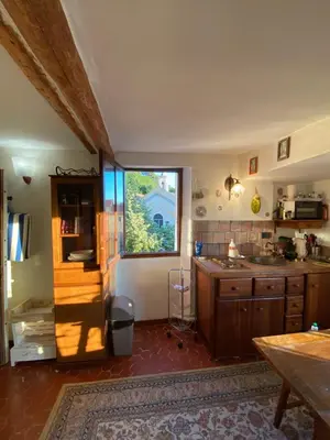 a kitchen with a sink and a window in it at CHARMANT HOME-Azur Charmant in Nice