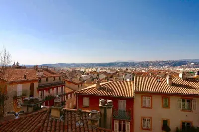 a view of a city with roofs and buildings at CHARMANT HOME - Mariesol in Nice