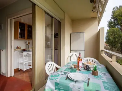 a patio with a table and chairs on a balcony at Apartment Le Vega by Interhome in Cagnes-sur-Mer