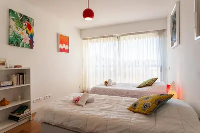 a bedroom with two beds and a window at LE FRANCIA II AP4197 By RIVIERA HOLIDAY HOMES in Nice