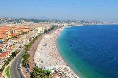 an aerial view of a beach and the ocean at LE FRANCIA II AP4197 By RIVIERA HOLIDAY HOMES in Nice