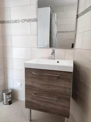 a bathroom with a sink and a mirror at L'Ambre d'Or in Falicon